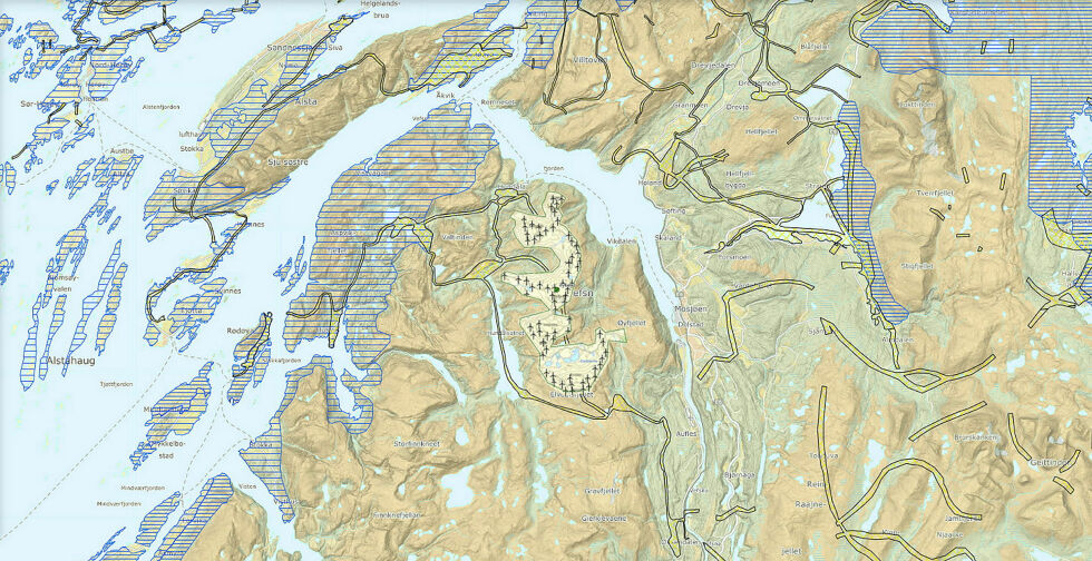 Slik ligger Øyfjellet vindkraftverk i Jillen-Njarke reinbeitedistrikt. De gule "gatene" er flyttleiene. Som vi ser overlapper vindkraftområdet flyttleiene. Det overlapper også andre årstidsbeiter som ikke er markert på dette kartet. Det blåskraverte feltet i nordøst er vinterbeitesone 5, som reinen skal flyttes til og fra to ganger i året. Montasje av vindkraftverket i reindriftskartet er gjort av Ságat.
 Foto: NVE